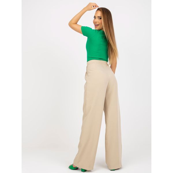 Fashionhunters Beige wide trousers made of fabric with pockets