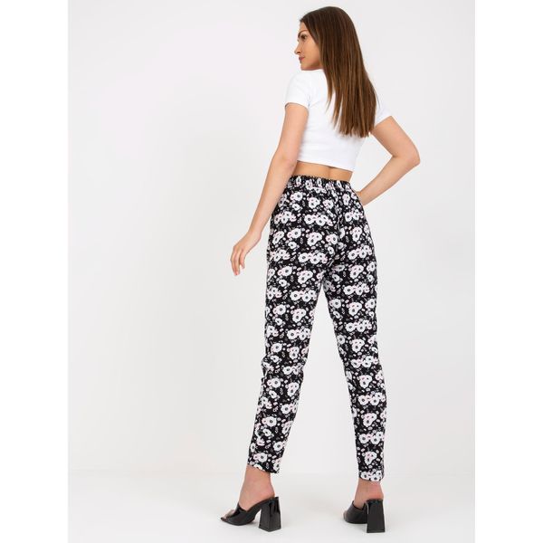 Fashionhunters Black light trousers made of fabric with flowers SUBLEBEL