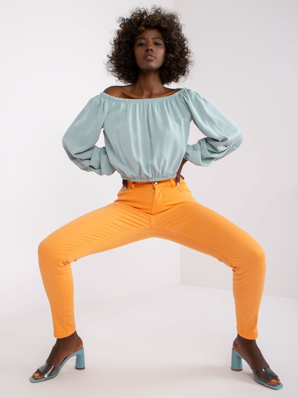 Fashionhunters Bright orange denim trousers from Marites with low rise