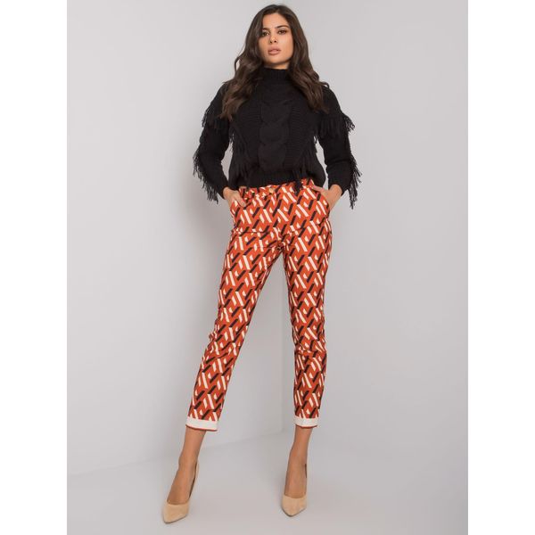 Fashionhunters Dark orange fabric pants with a pattern