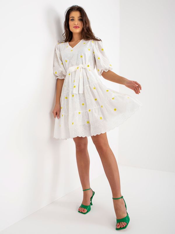 Fashionhunters Ecru-yellow dress with ruffle in openwork pattern