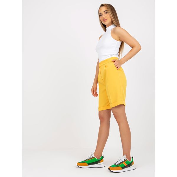 Fashionhunters Elegant dark yellow long shorts with a high waist