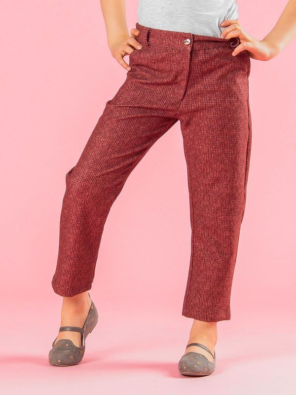 Fashionhunters Girls' trousers with a print imitating brick wool