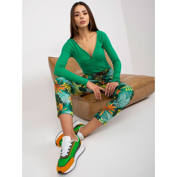 Fashionhunters Green patterned sweatpants with pockets