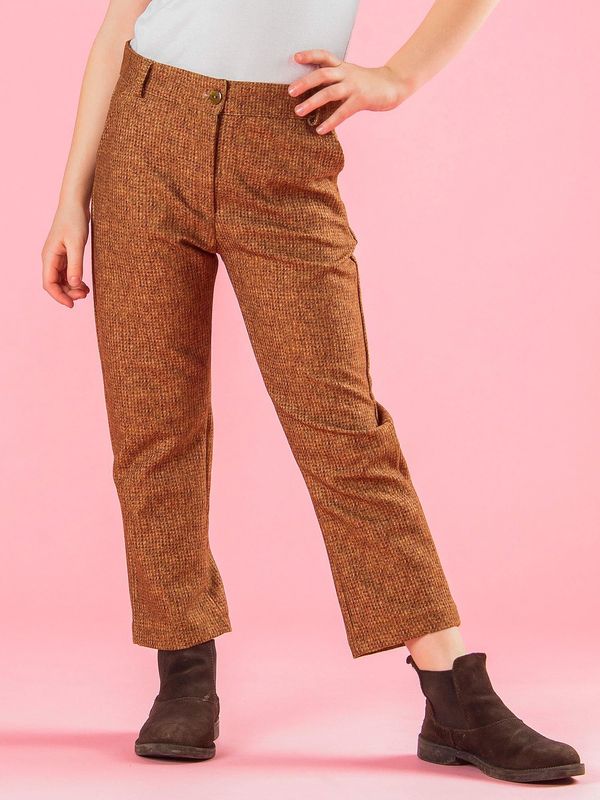 Fashionhunters Light brown girls' trousers with wool imitation print