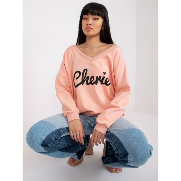 Fashionhunters Light pink oversized sweatshirt with a print