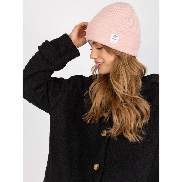 Fashionhunters Light pink winter hat for women with a stripe