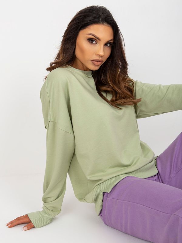 Fashionhunters Pistachio loose hoodie with round neckline