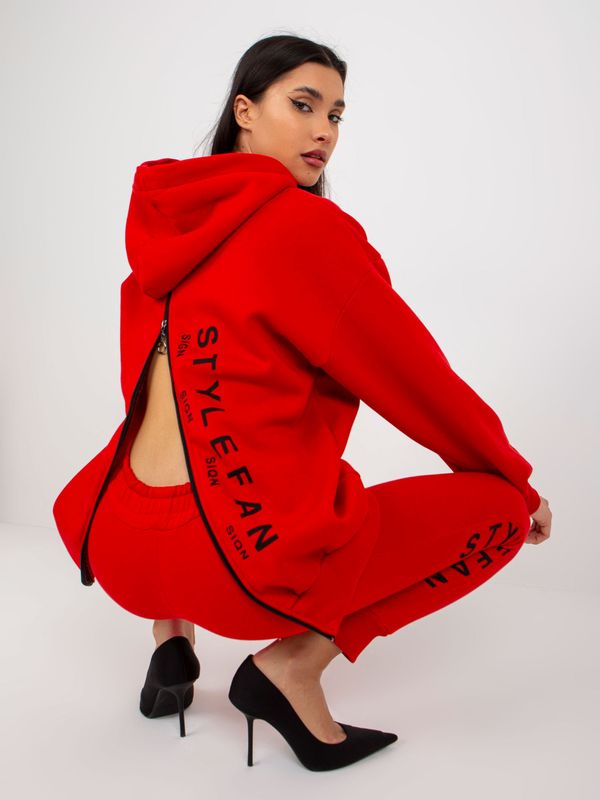 Fashionhunters Red women's tracksuit with zippers and inscriptions