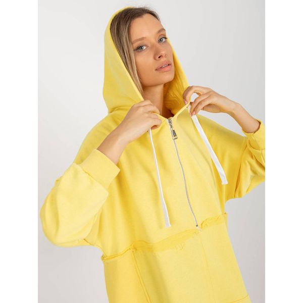 Fashionhunters Yellow oversized long sweatshirt with a hood and a zipper