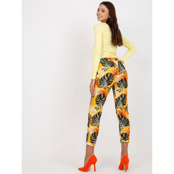 Fashionhunters Yellow patterned cotton sweatpants