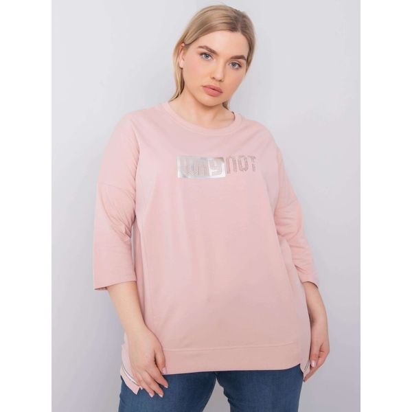 Fashionhunters Zgaszona różowa bawełniana bluzka plus size z aplikacją