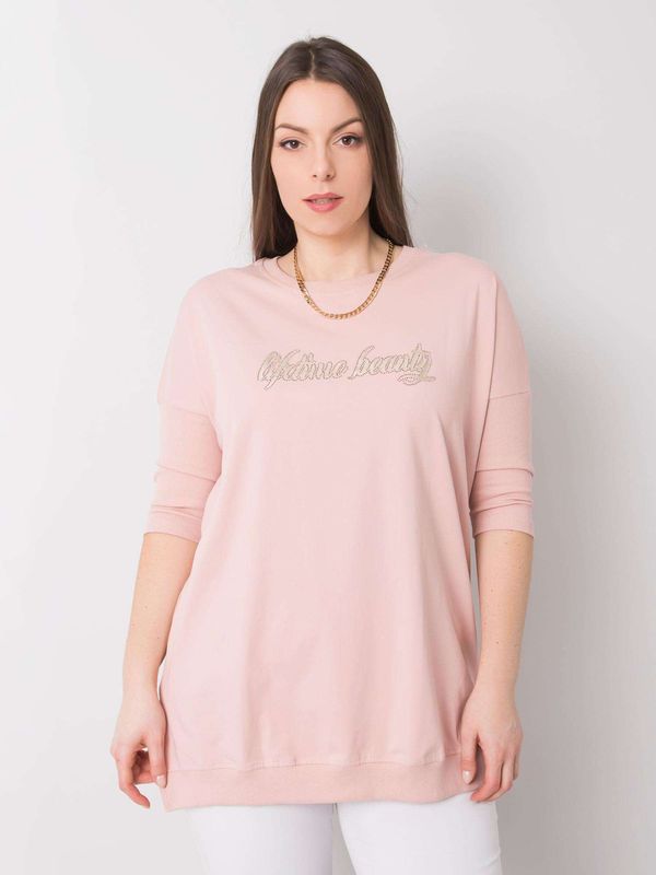 Fashionhunters Zgaszona różowa bluzka damska plus size z napisem