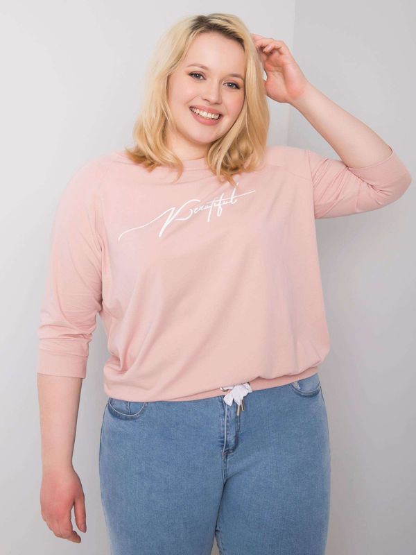 Fashionhunters Zgaszona różowa bluzka damska z napisem