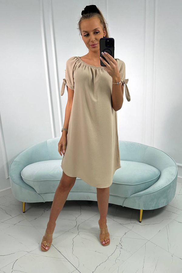 Kesi Dress with tie on the sleeves of beige color