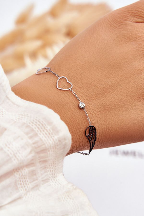 Kesi Fashion bracelet with stainless steel wing and two hearts silver