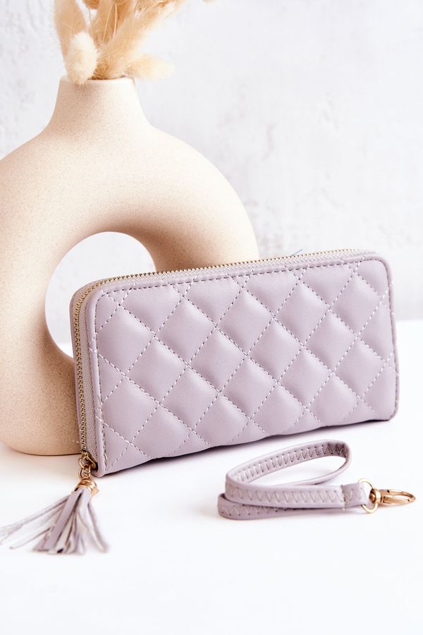 Kesi Large quilted wallet with fringe Grey Selley