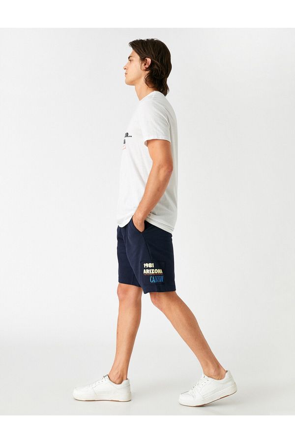 Koton Koton Shorts - Navy blue - Slim