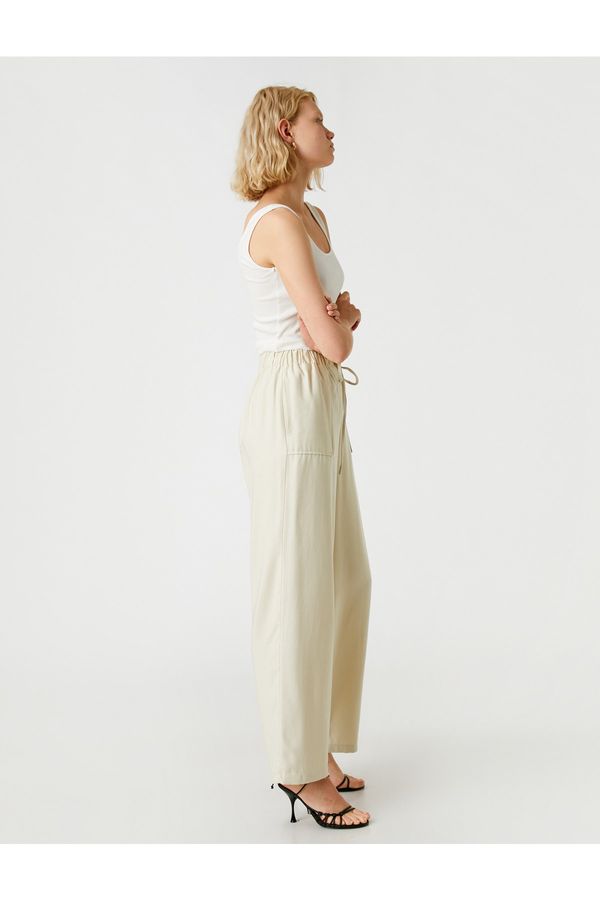 Koton Koton Silk Look Trousers with Pockets Comfortable Cut